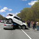 Illustration for article titled This SUV Landed On Top Of This Volvo And Nobody Was Hurt
